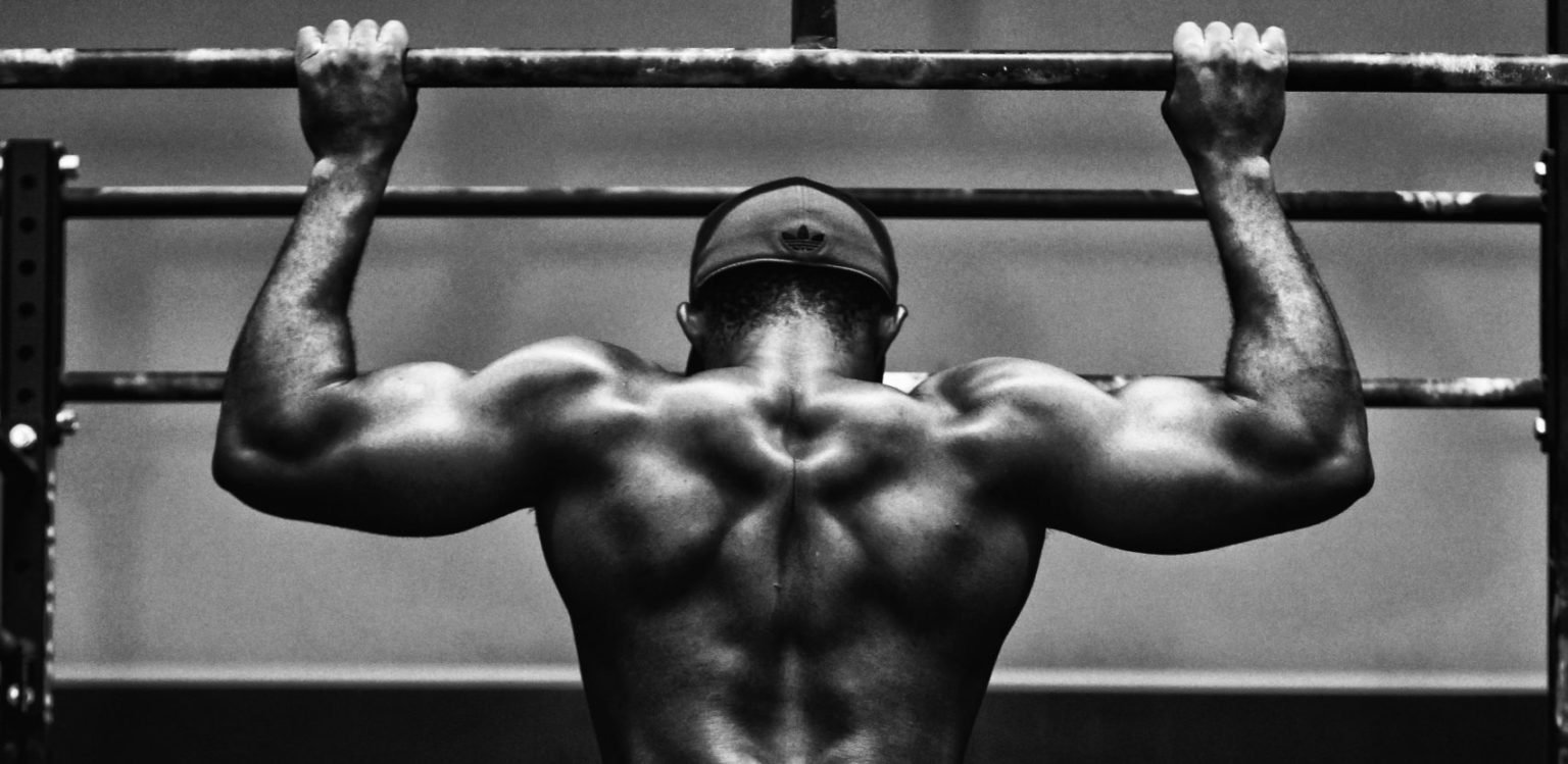 Legionnaire doing pull-ups during physical training